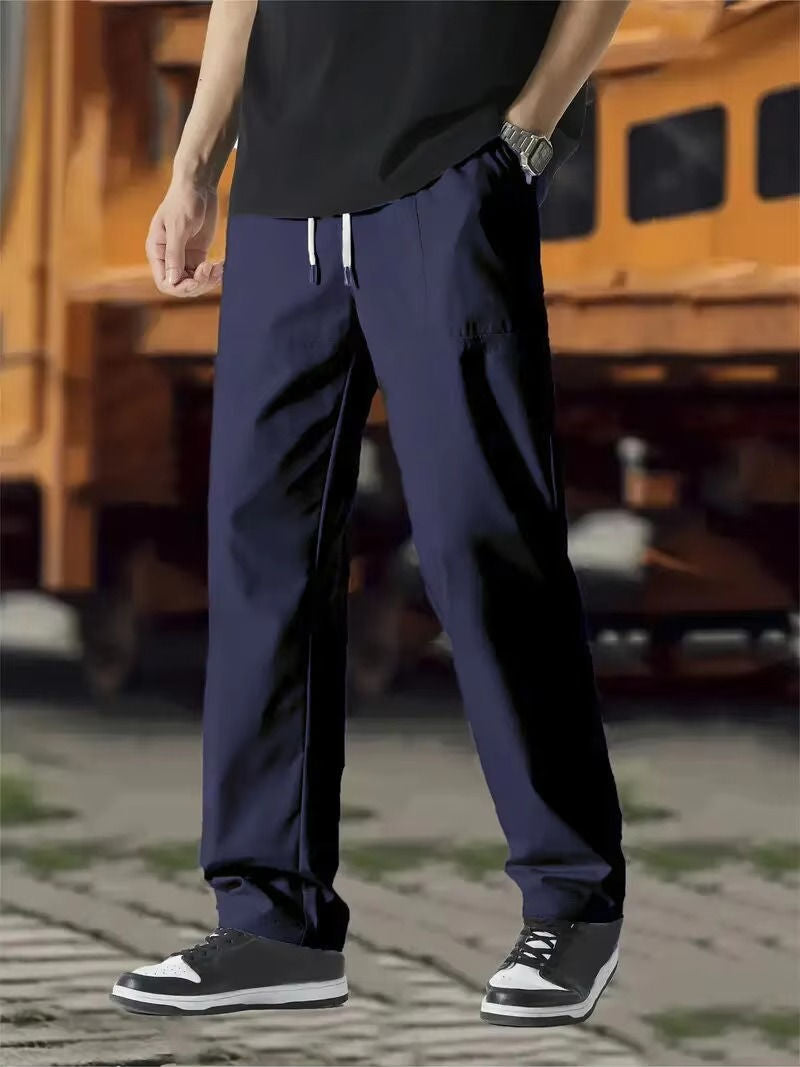 Men's gray jogger track pants modern fit with elastic drawstring waist, flexible fabric by Wavlynn