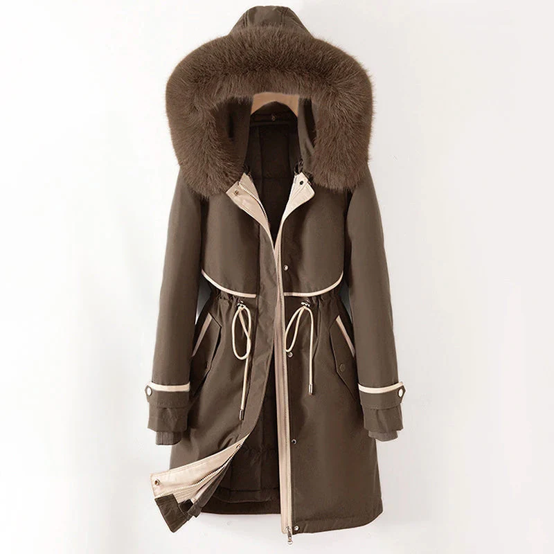 Women's tailored fit parka jacket with fur trim hood and quilted lining for cold-weather style
