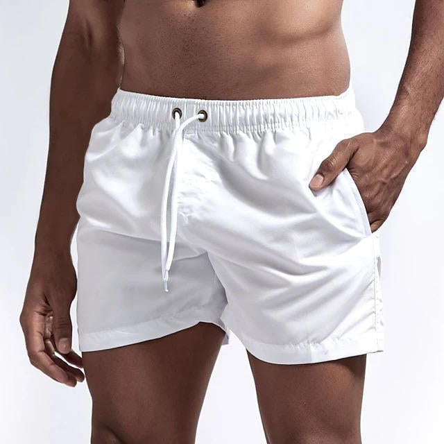 Men's gray quick-dry swim trunks with drawstring waist, comfort fit, and built-in mesh lining
