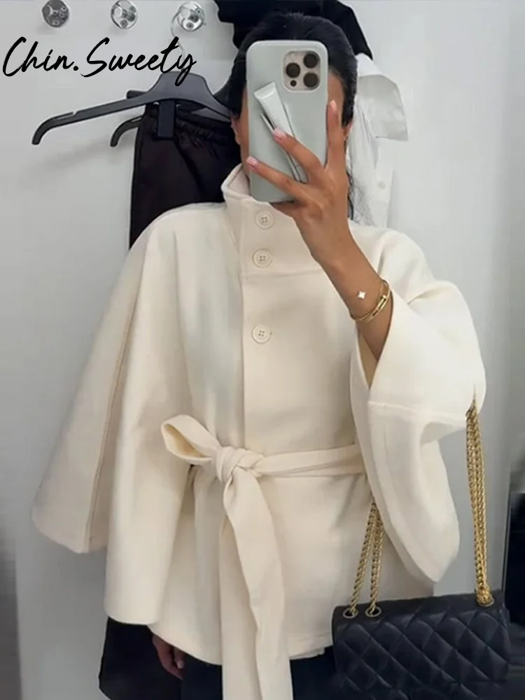 Women's wool blend cape jacket high neck belted waist draped silhouette elegant chic outerwear