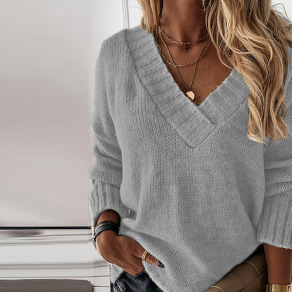 Women's oversized V-neck knit sweater relaxed fit with ribbed sleeve and hem details for everyday comfort