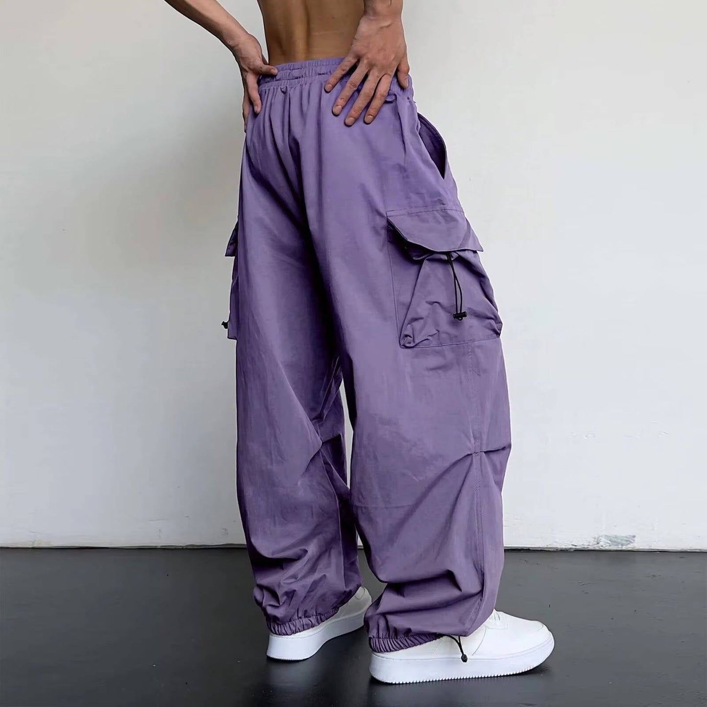 Men's baggy cargo pants wide leg fit large side pockets drawstring waist streetwear style