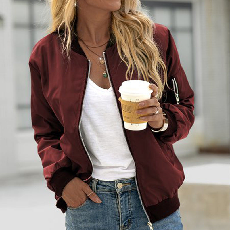 Women casual lightweight zip-up bomber jacket street-style layering piece with front zipper closure
