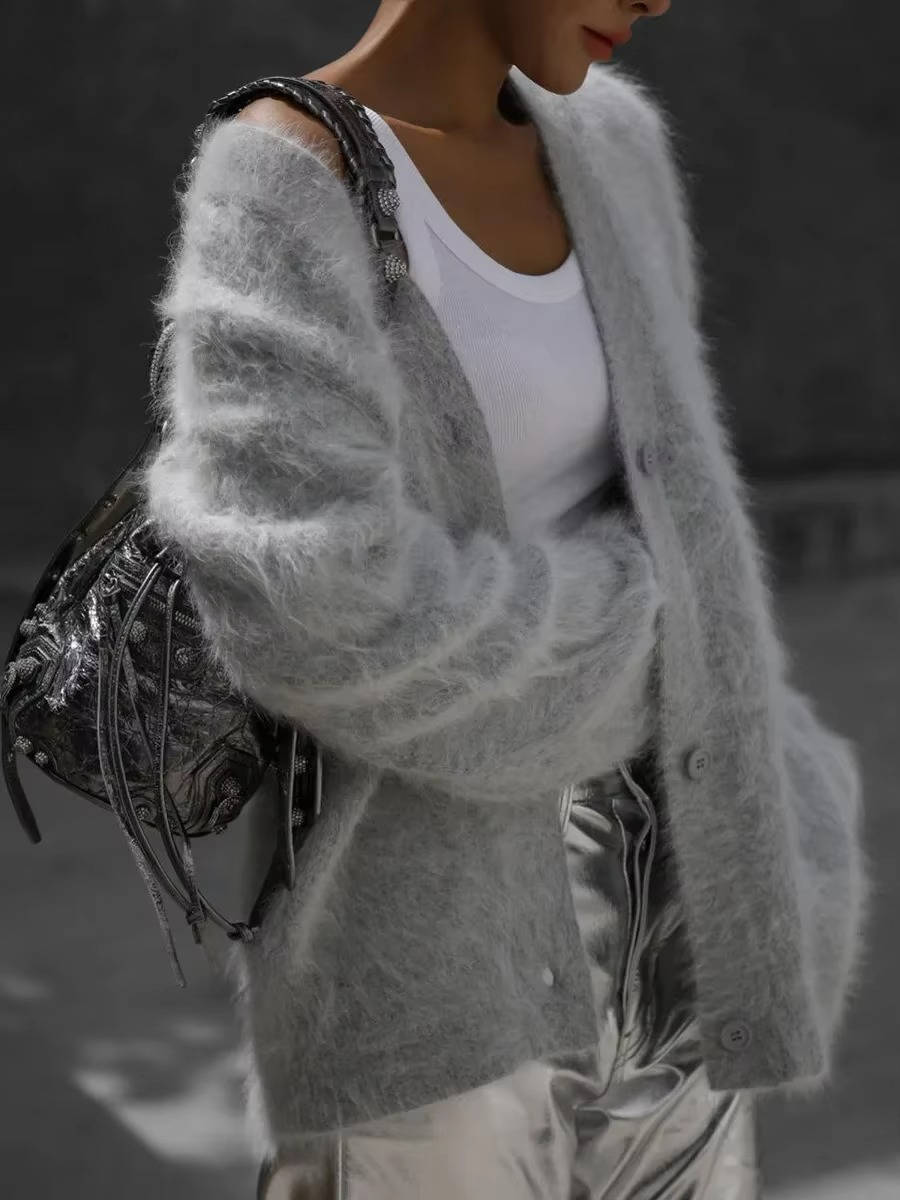 Women's fuzzy cropped cardigan in soft plush knit with button closure, ultra-cozy relaxed silhouette