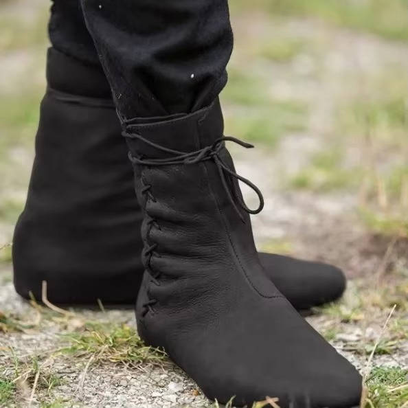 Brown medieval Viking leather boots with adjustable cross-strap system for cosplay and Renaissance fairs