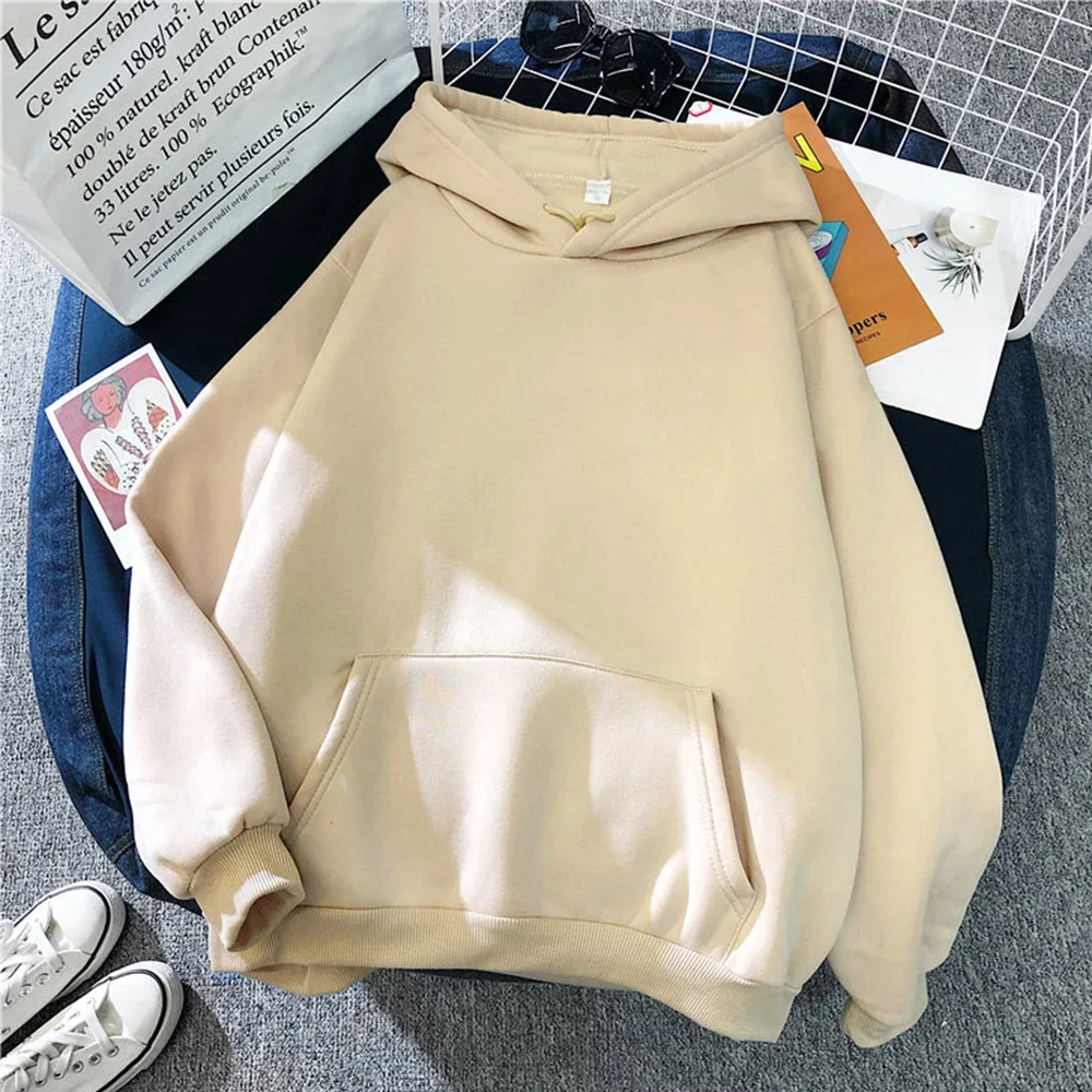 Women's oversized fleece hoodie in neutral tone with kangaroo pocket and ribbed cuffs