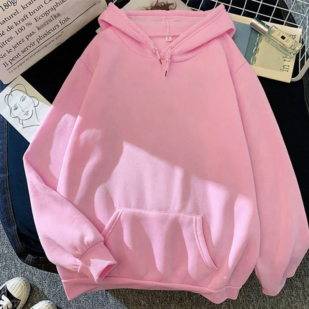 Women's oversized fleece hoodie in neutral tone with kangaroo pocket and ribbed cuffs