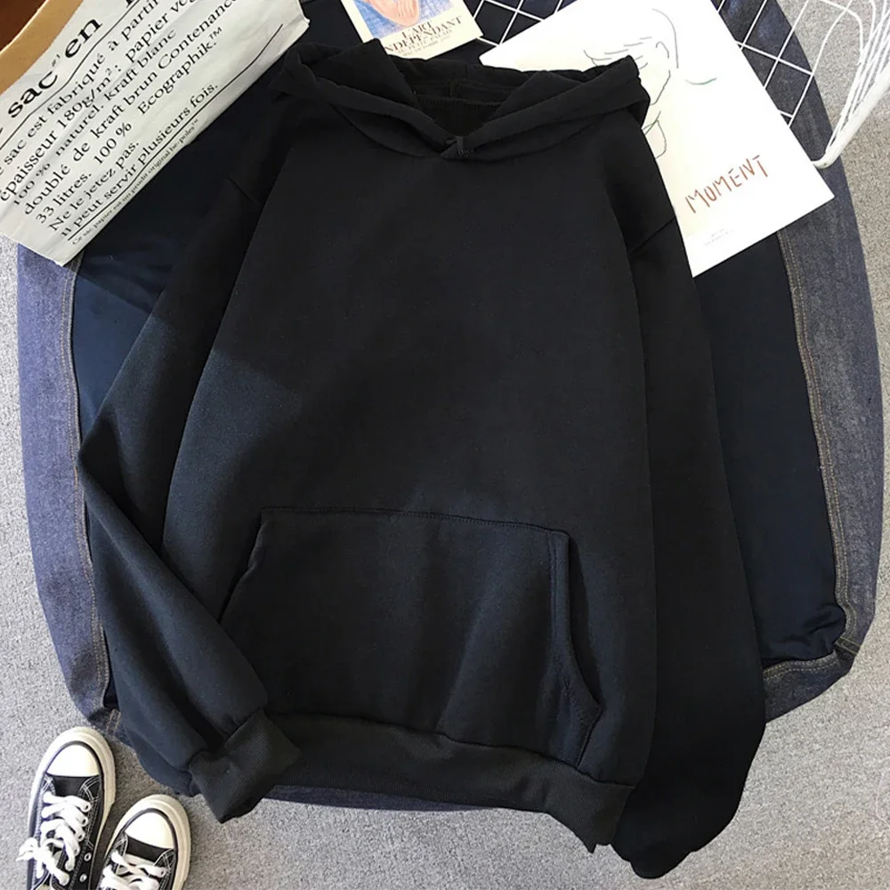 Women's oversized fleece hoodie in neutral tone with kangaroo pocket and ribbed cuffs