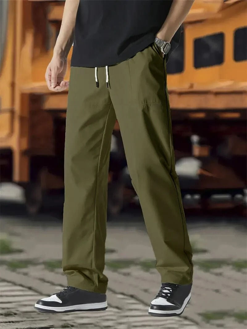 Men's gray jogger track pants modern fit with elastic drawstring waist by Wavlynn flexible fabric