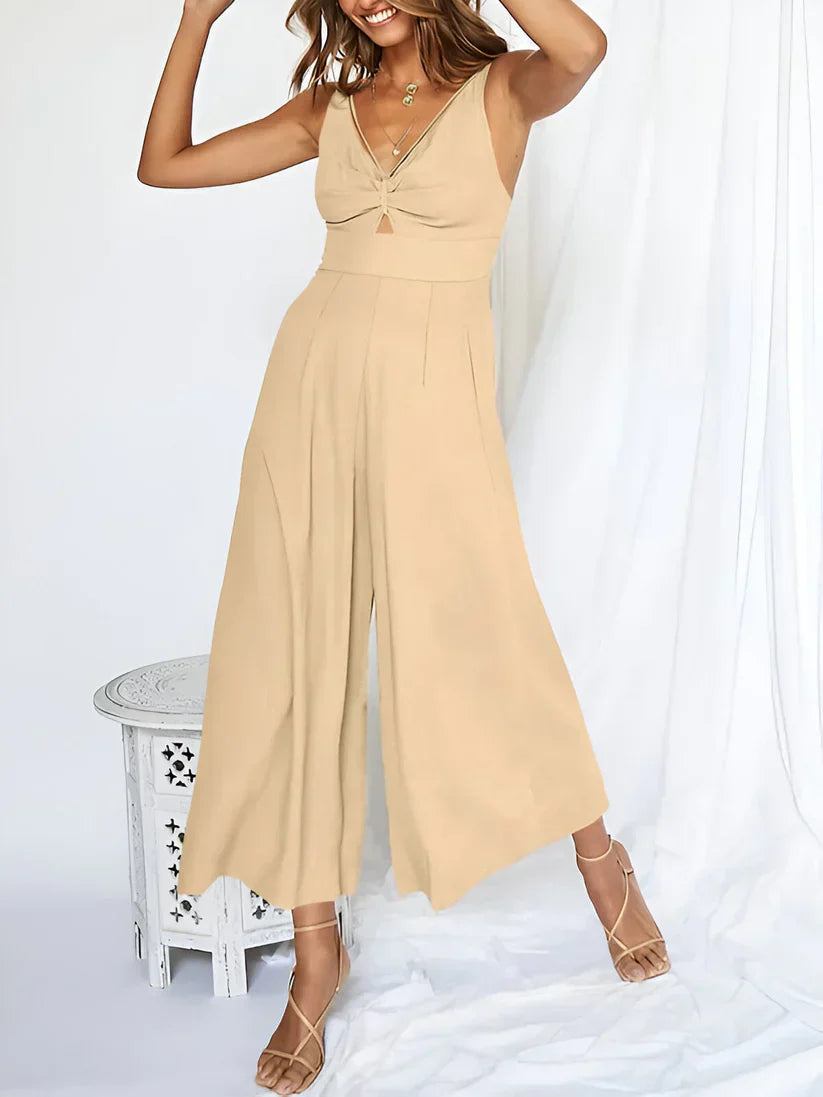 Navy blue sleeveless wide-leg jumpsuit with V-neck and high waist for women