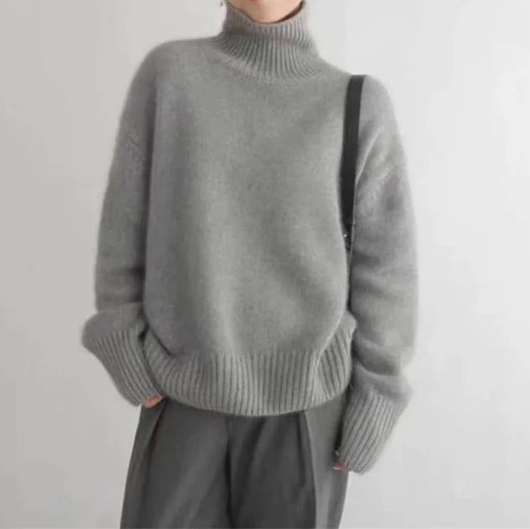 Women's oversized cashmere turtleneck sweater relaxed silhouette soft luxury everyday warmth