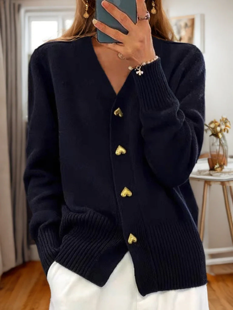 Soft wool-blend unisex cardigan in cozy knit with V-neck and heart-shaped button details