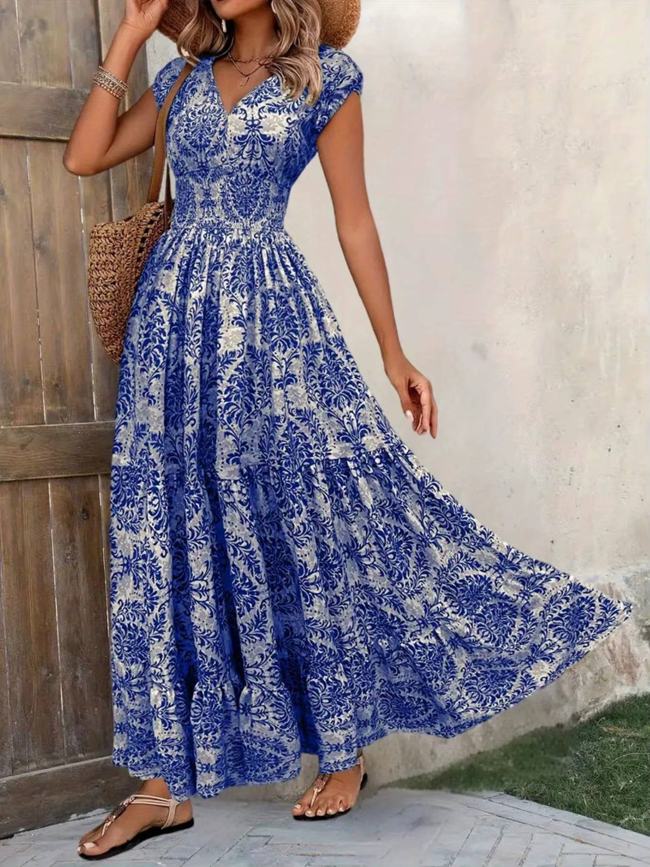 Women's boho print tiered maxi dress with smocked elastic waist in flowing relaxed silhouette