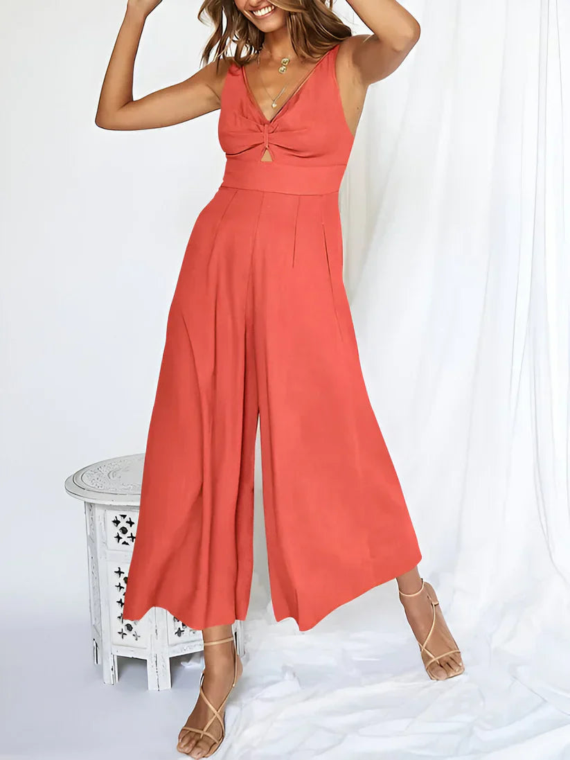 Navy blue sleeveless wide-leg jumpsuit with V-neck and high waist for women