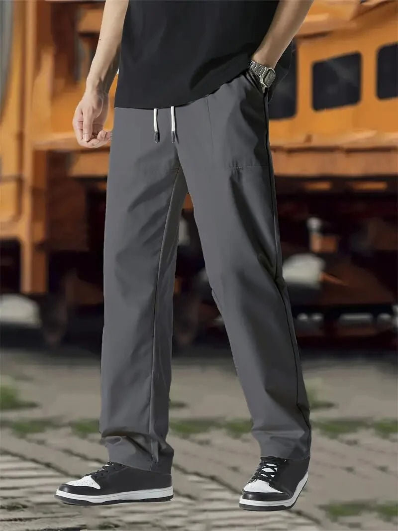 Men's gray jogger track pants modern slim fit with elastic drawstring waist by Wavlynn