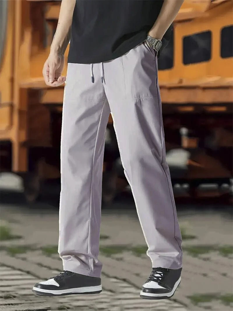 Men's gray jogger track pants modern fit with elastic drawstring waist flexible fabric by Wavlynn