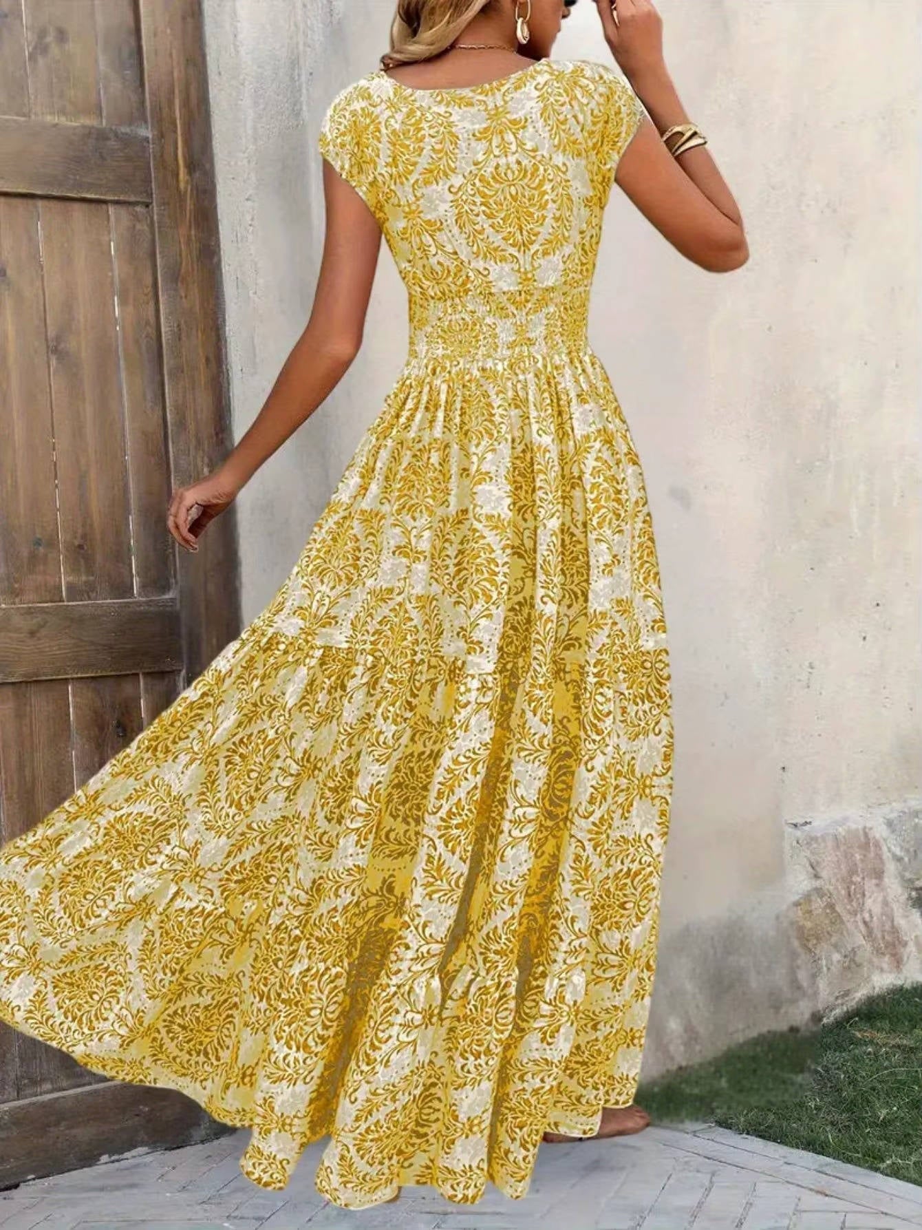 Women's boho print tiered maxi dress with smocked elastic waist, flowing silhouette