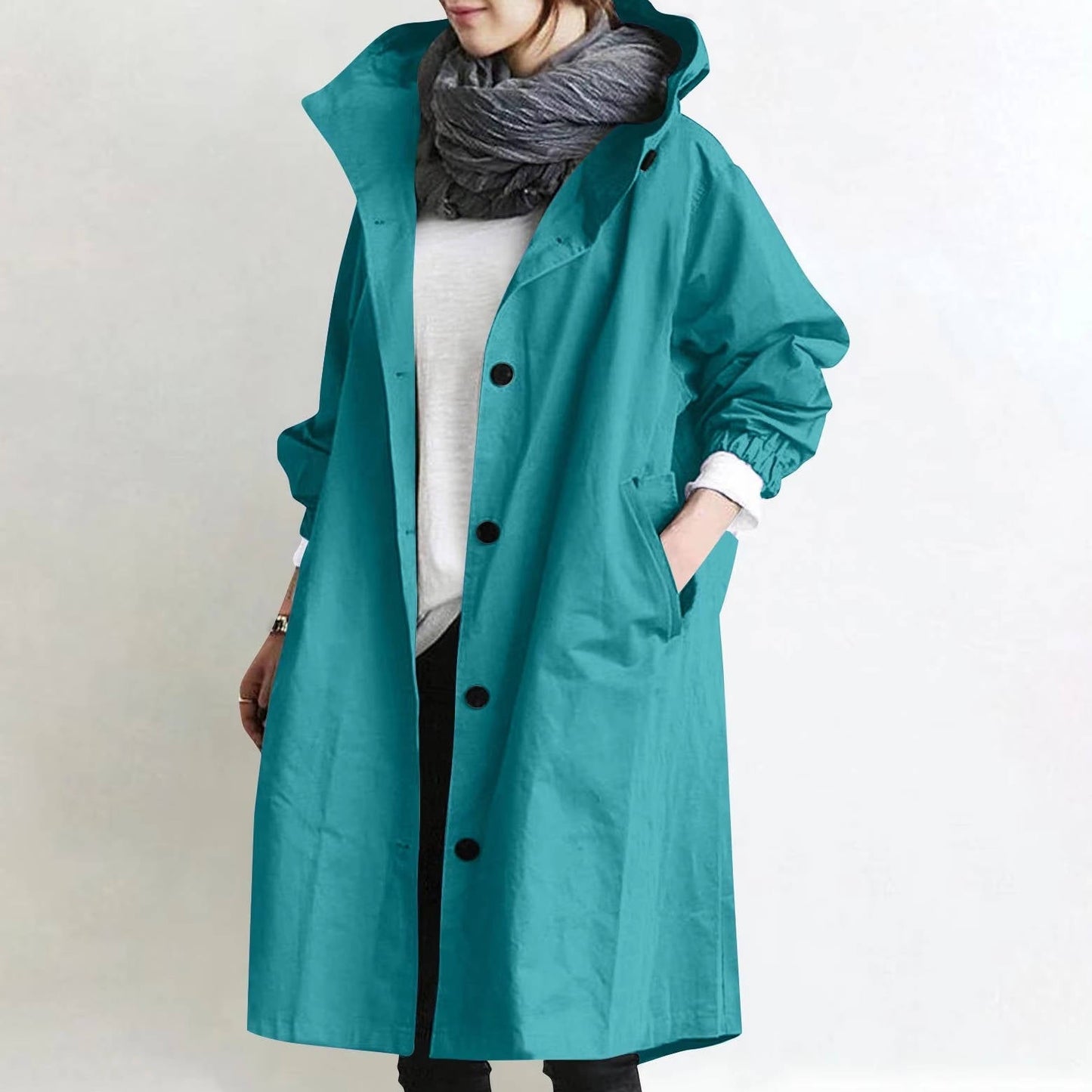 Women's oversized waterproof trench coat in neutral tone, relaxed silhouette with ultra-dry polyester fabric