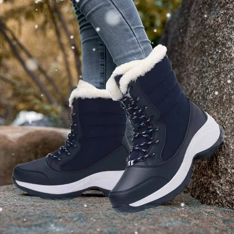 Women's winter snow boots in neutral tones, waterproof leather upper with lightweight casual everyday design