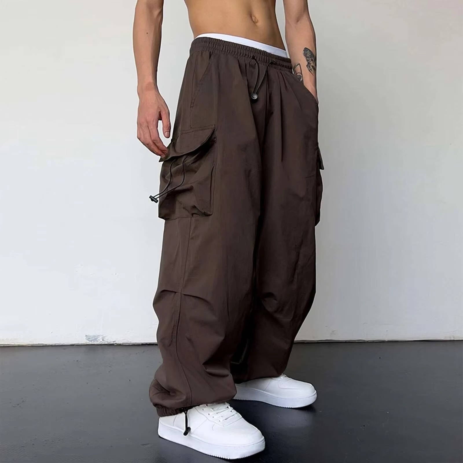 Men's baggy cargo pants wide leg fit large side pockets drawstring waist streetwear style