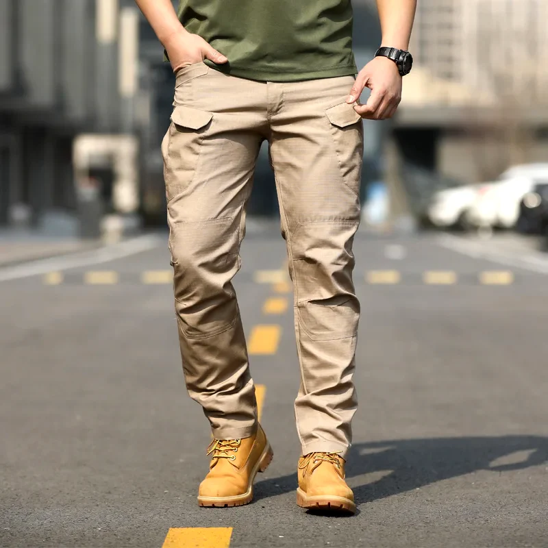 Men's relaxed fit cotton cargo pants multi-pocket utility design in neutral tone by Wavlynn