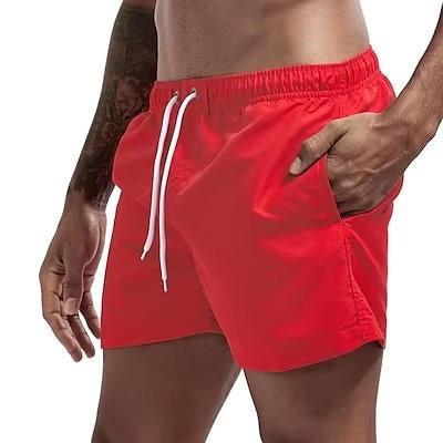 Men's gray quick-dry swim trunks with drawstring waist, comfort fit, and built-in mesh lining
