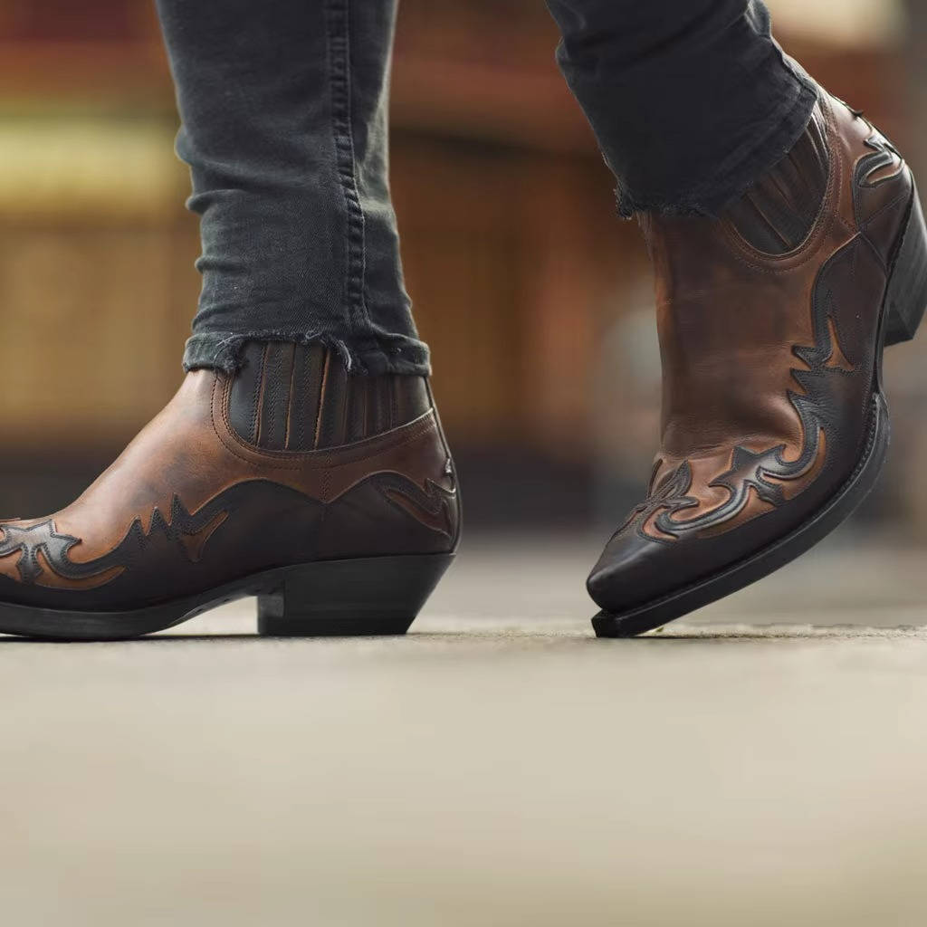 Women's western ankle boots in tan PU leather with classic cowgirl silhouette and stacked heel