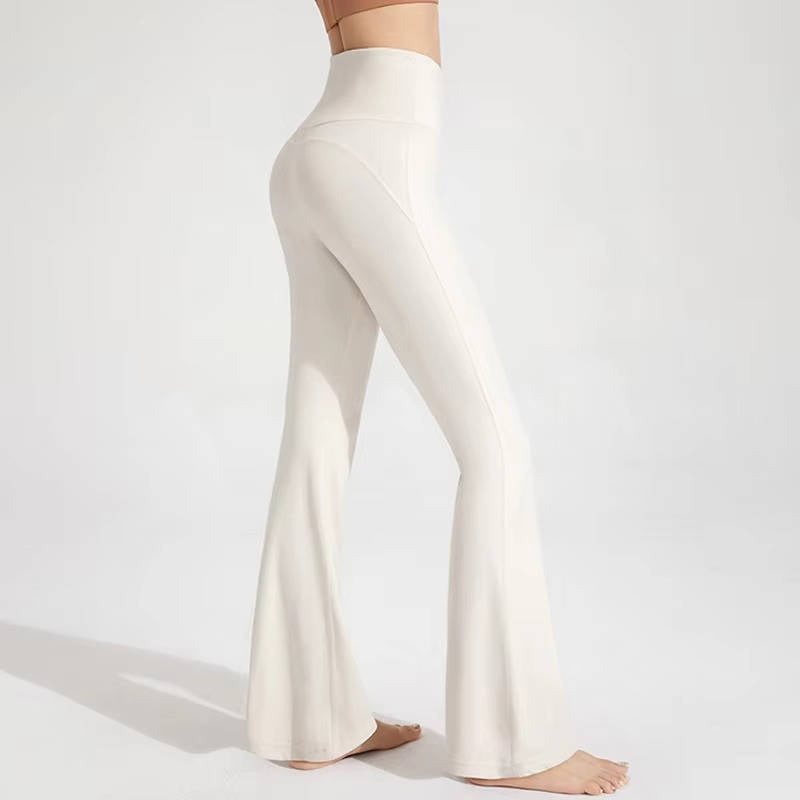 Black high waisted flared leggings with tummy control wide waistband, flattering active fit