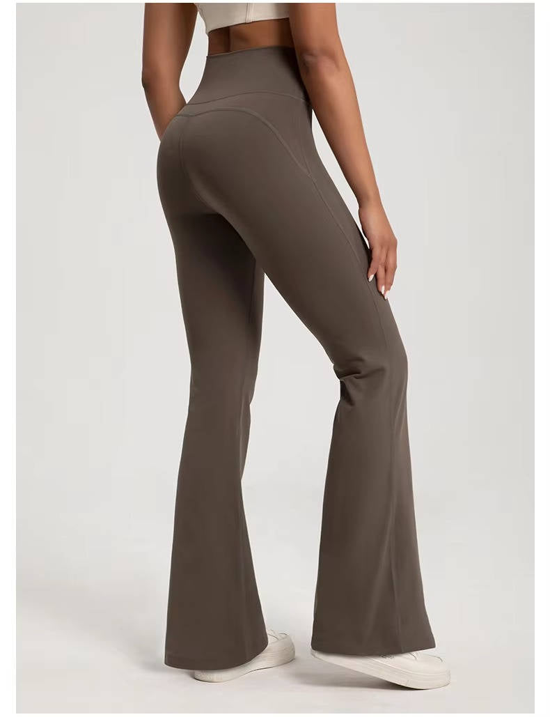 High waisted flared leggings with tummy control waistband, flattering active fit for studio and everyday wear