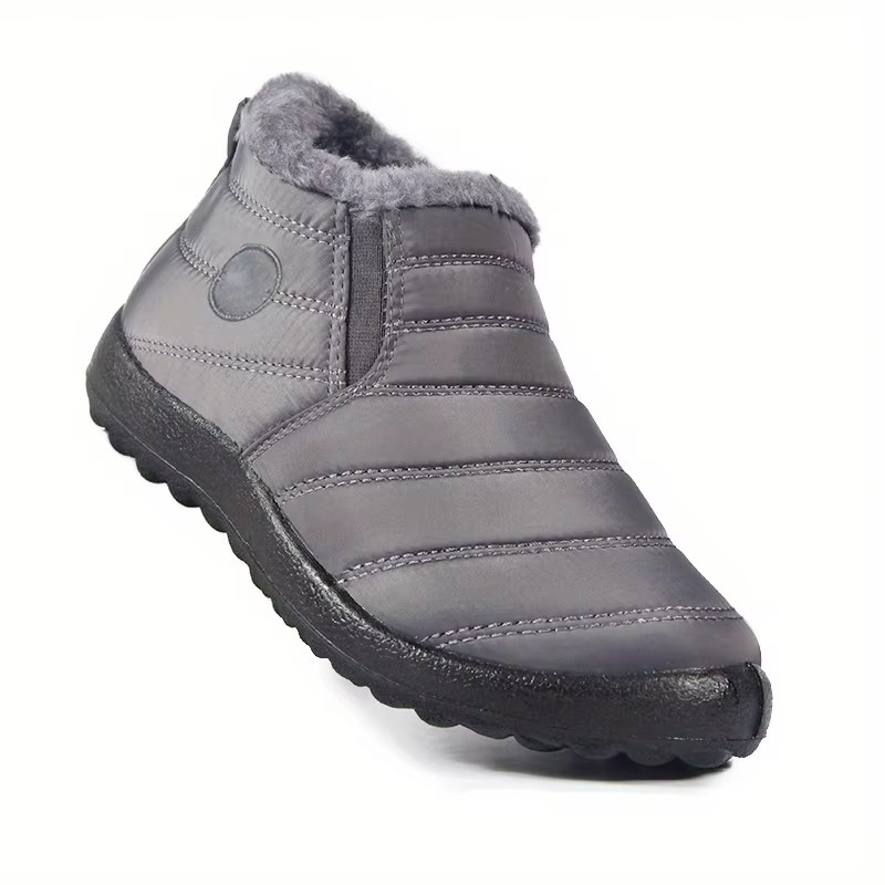 Women's waterproof low-top snow boots in neutral tones with slip-resistant sole for winter warmth