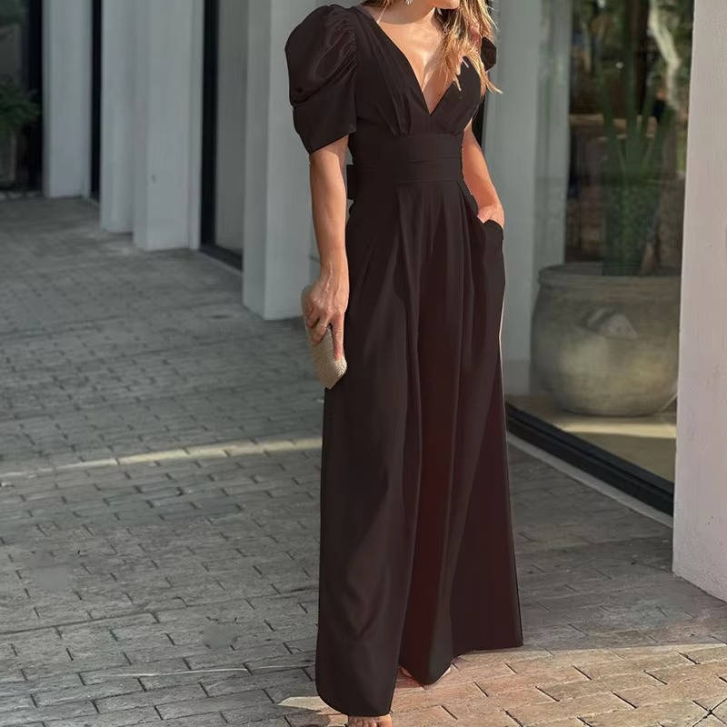 Women's elegant black wide-leg tailored jumpsuit with fitted bodice and back button closure