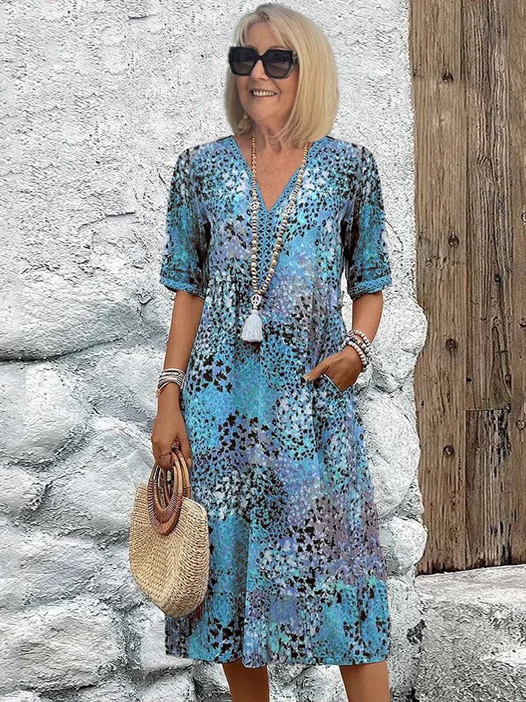 Colorful midi dress with bold eye-catching pattern, effortless elegant silhouette for brunch or evening wear