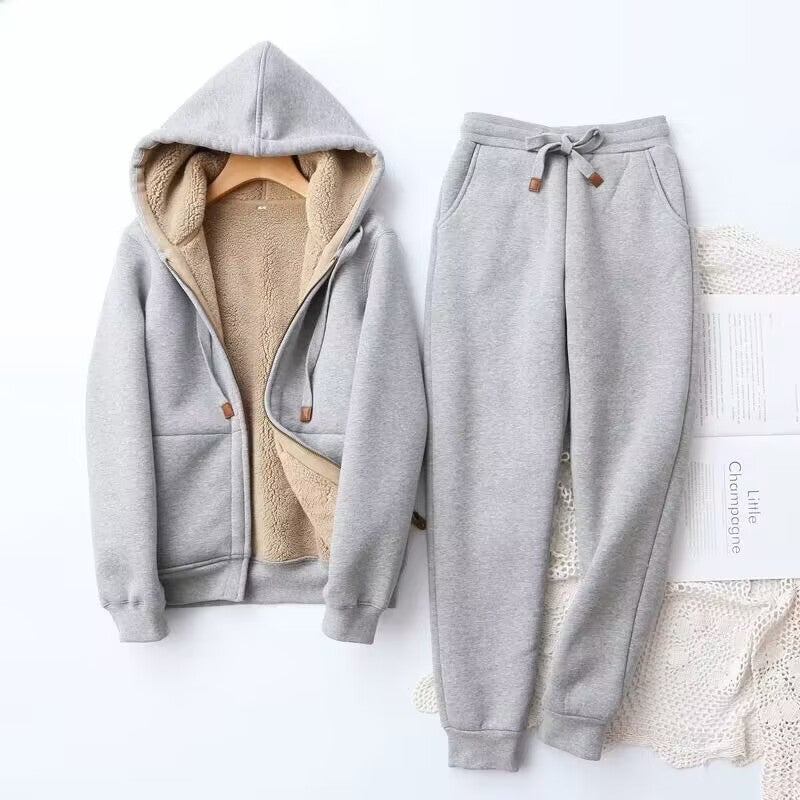 Women's gray fleece-lined hoodie and jogger set with relaxed fit for cozy winter comfort