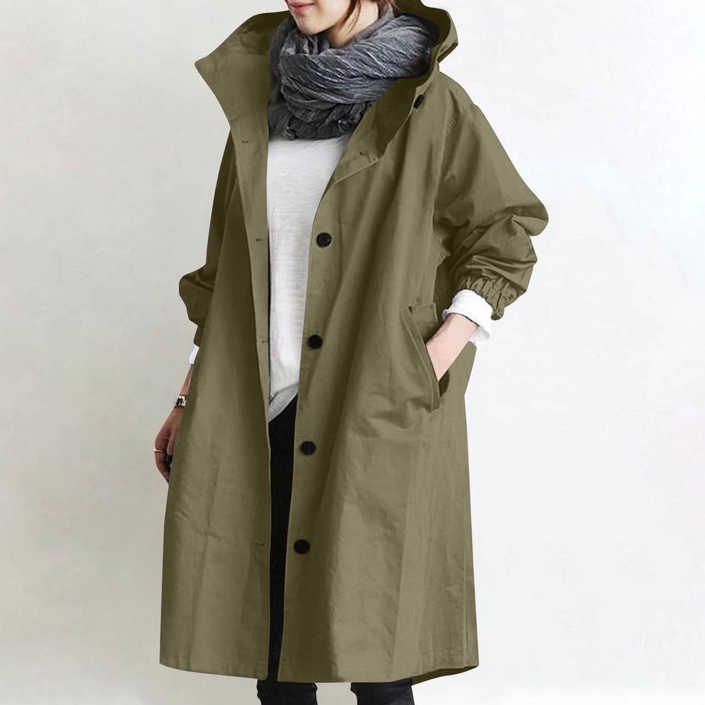 Women's oversized waterproof trench coat in neutral tone, relaxed silhouette with ultra-dry polyester fabric