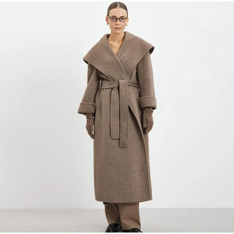 Women's wool overcoat lace-up detail double-breasted tailored silhouette winter warmth elegant style