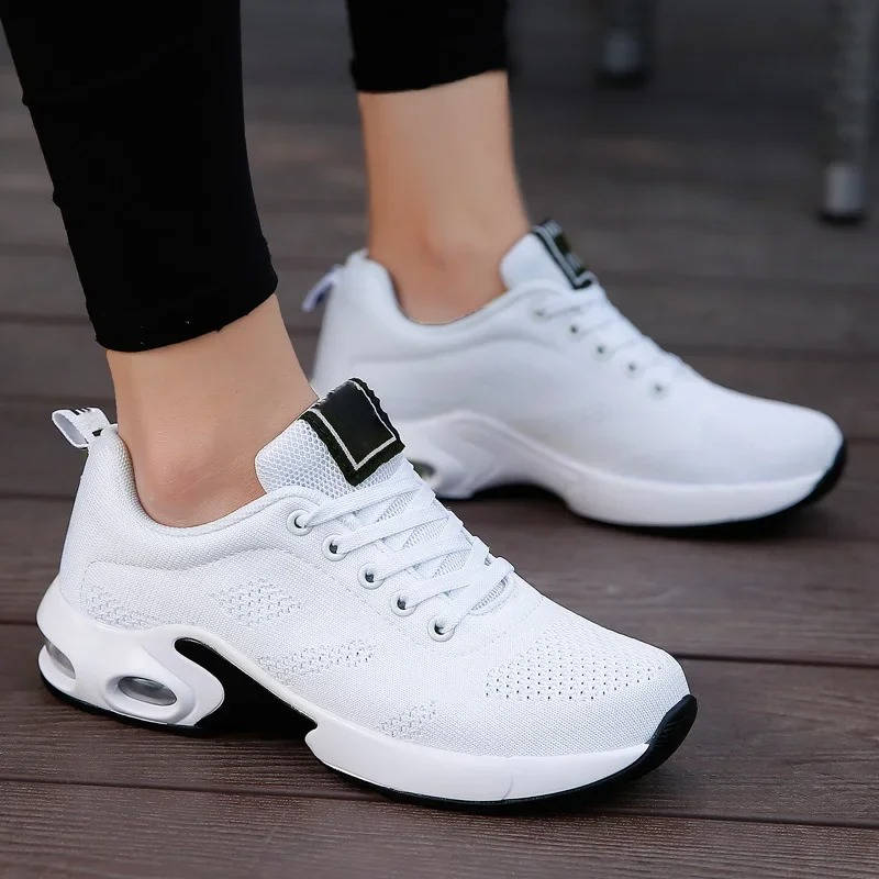 Women's light gray comfort walking shoes with breathable stretch knit upper and cushioned support sole