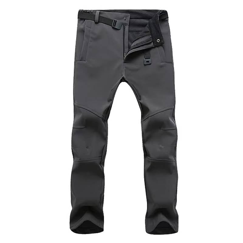 Men's lightweight waterproof hiking pants, black, slim athletic cut with fleece-lined interior for winter trails
