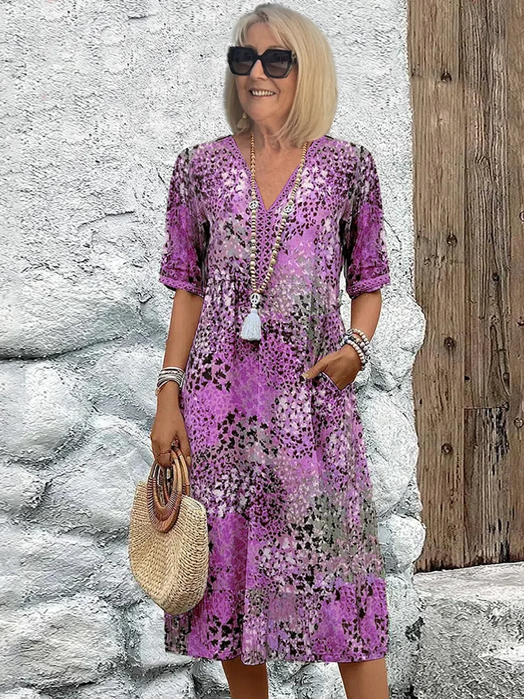 Colorful midi dress with bold eye-catching pattern, effortless elegant silhouette for versatile occasions