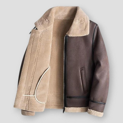 Men's black faux leather relaxed fit hip-length jacket with plush shearling trim and zipper closure