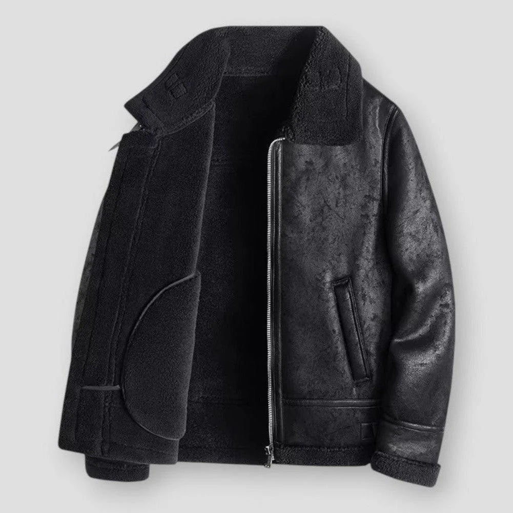Men's black faux leather relaxed fit hip-length jacket with plush shearling trim and zipper closure