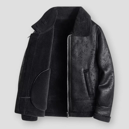 Men's black faux leather relaxed fit hip-length jacket with plush shearling trim and zipper closure