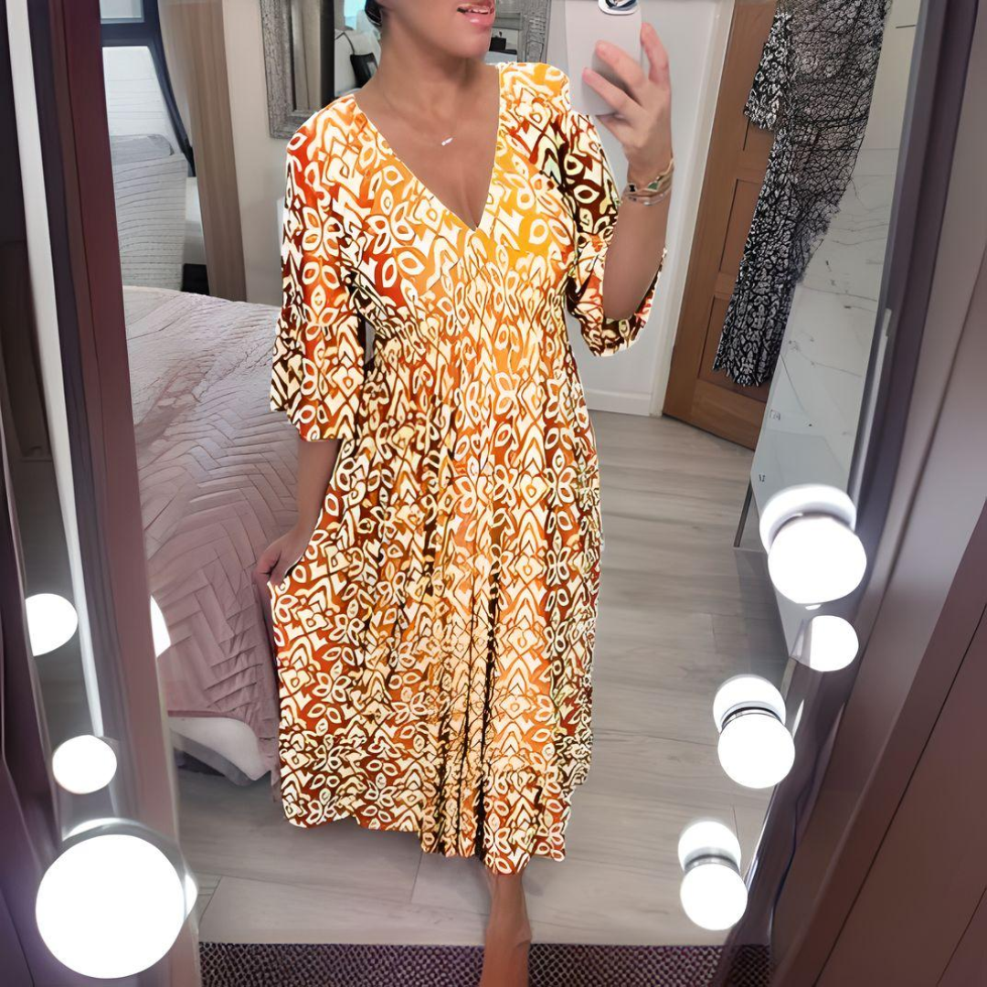 Women's boho flowy printed dress with fitted waist and flowing skirt for effortless feminine style