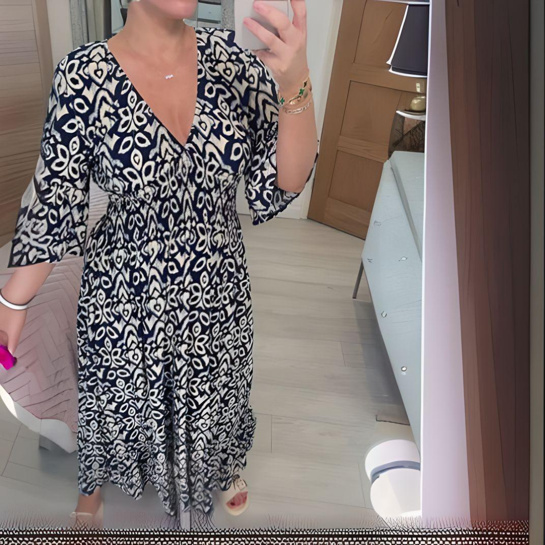 Women's boho flowy printed dress with flattering fitted waist and flowing skirt silhouette