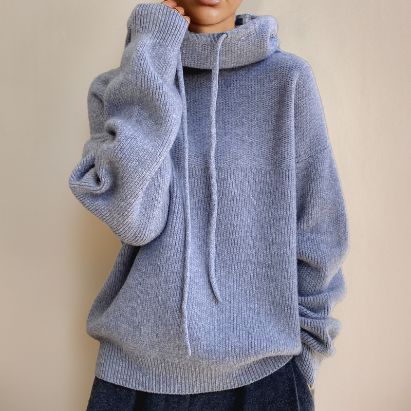 Women's oversized knit sweater with high drawstring collar and soft long sleeves for cozy fall style