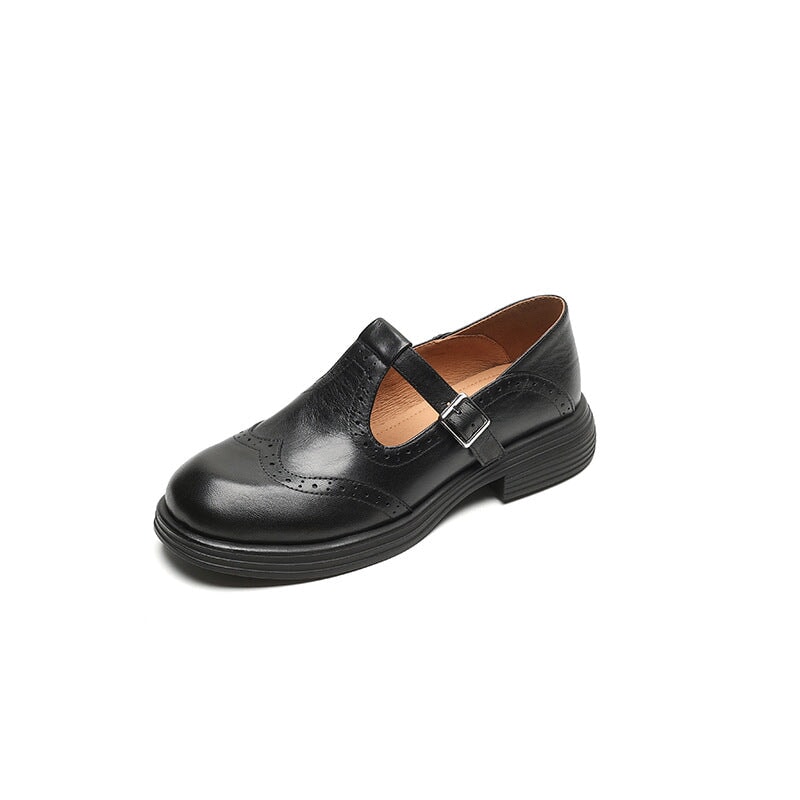 Women's brown leather Mary Jane shoes with T-strap, block heel, and vintage brogue detailing