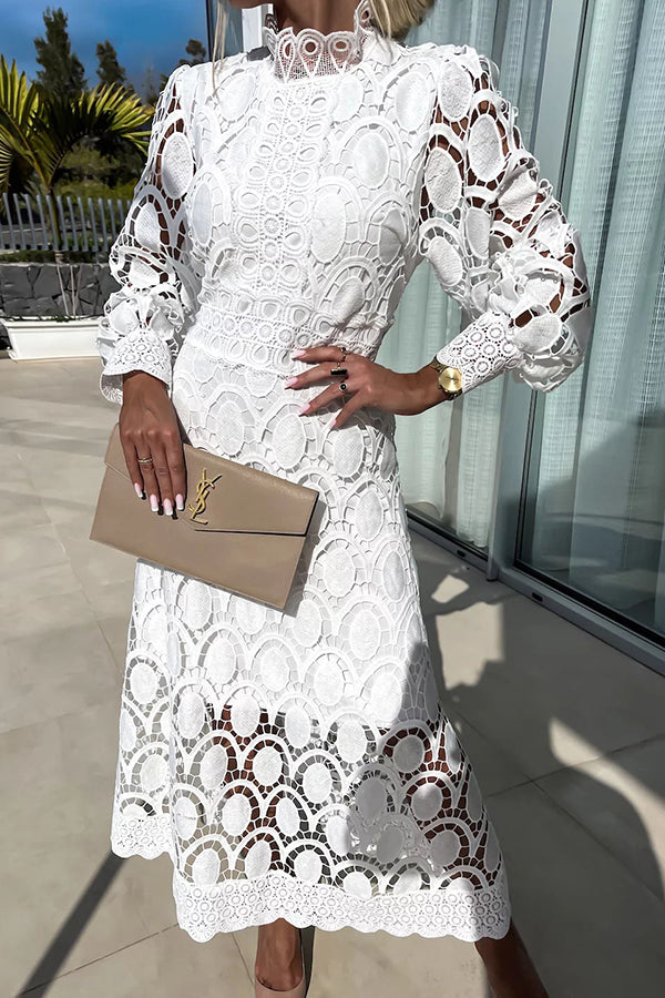 Women's white lace midi dress A-line silhouette with long sleeves and romantic floral detailing