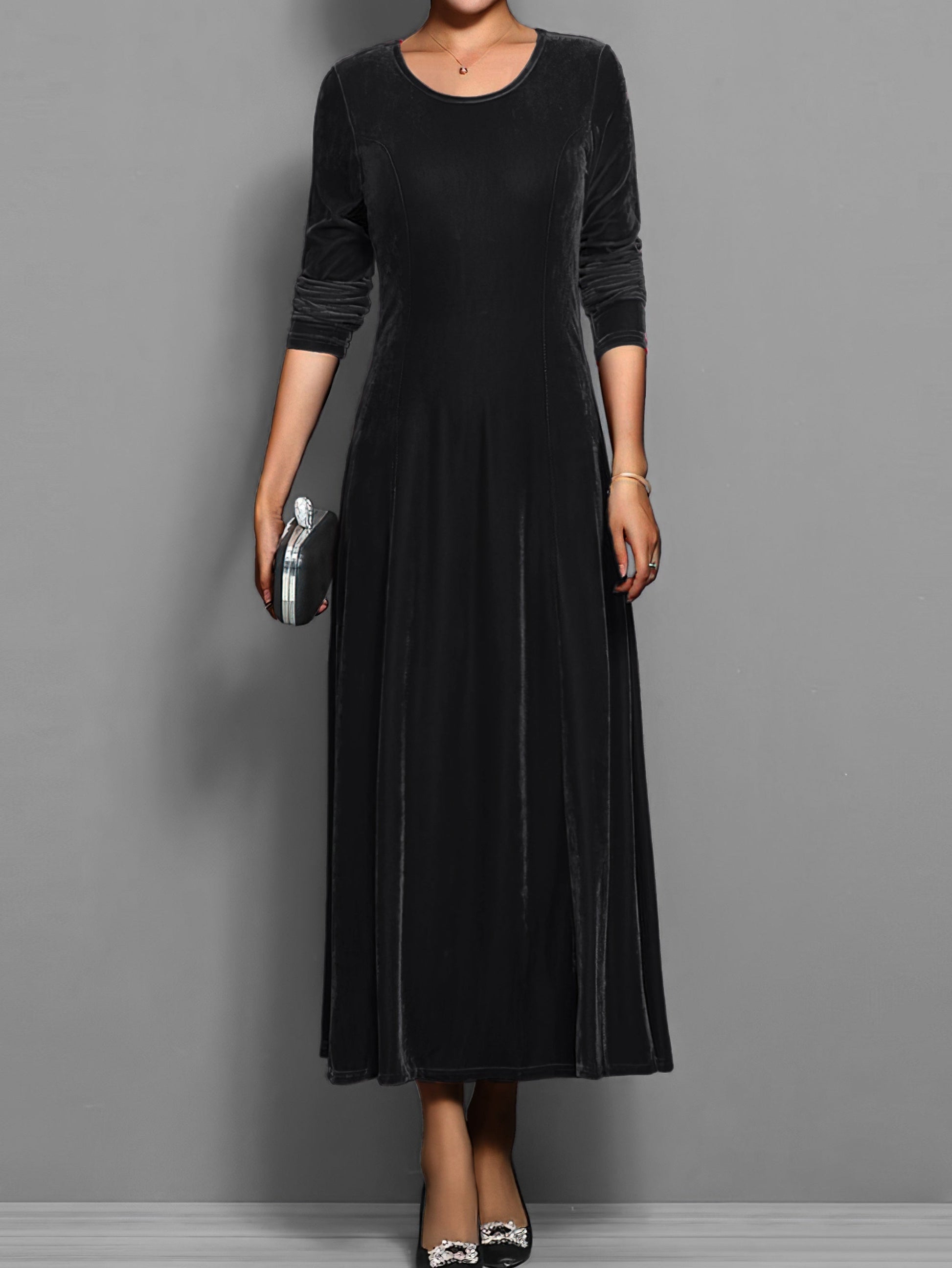 Soft velvet midi dress in rich jewel tone, elegant fitted silhouette with luxurious texture