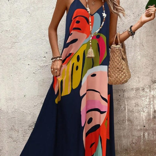 Women's vibrant green leaf print maxi dress with flowy relaxed fit, tropical summer style