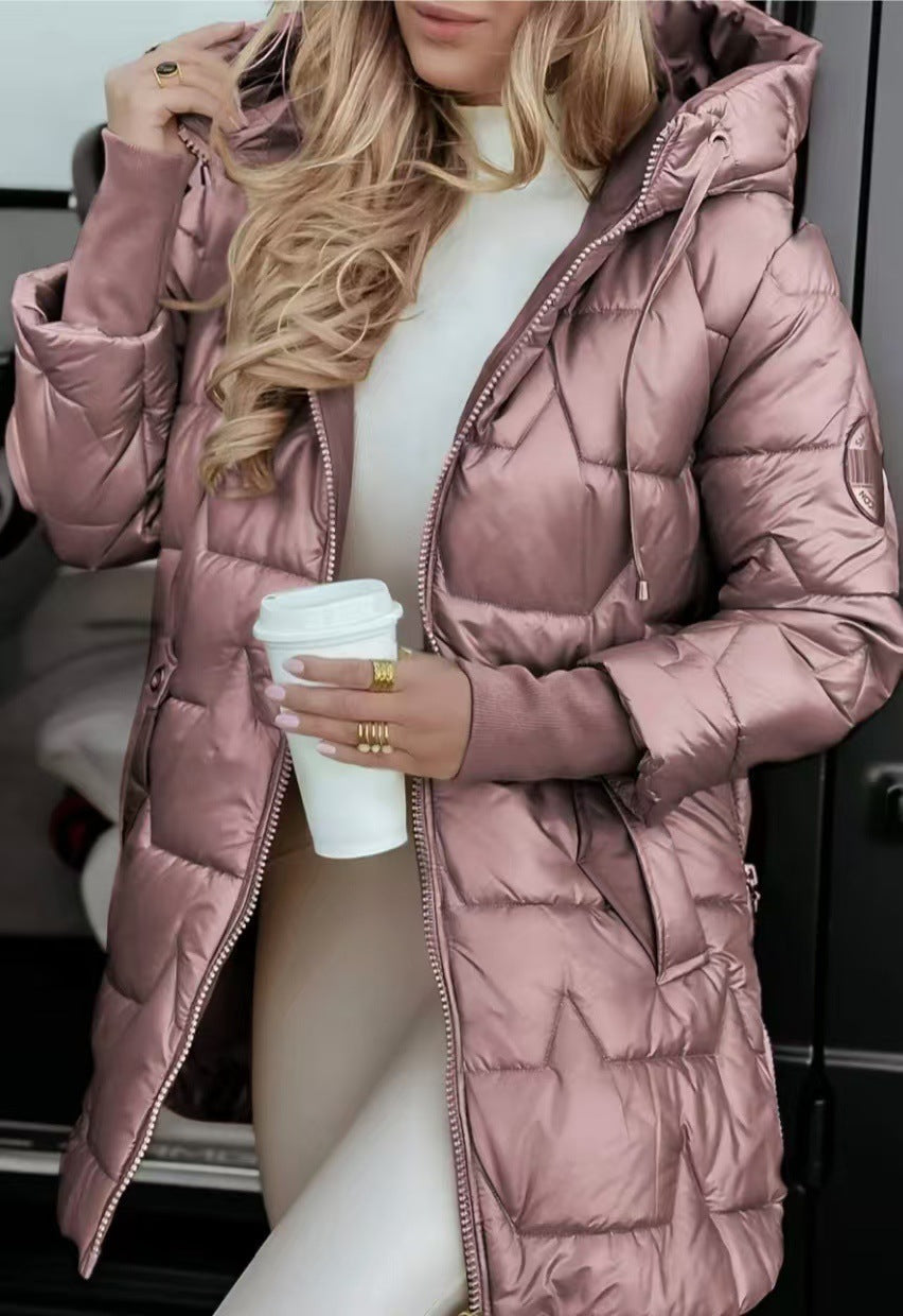 Unisex longline hooded puffer coat in neutral tones, insulated with minimalist chic design