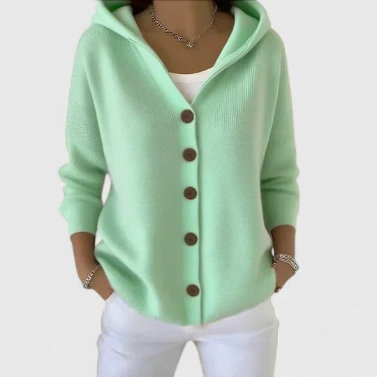 Elegant cream knit cardigan with flattering drape and lightweight layering design for casual or dressy wear
